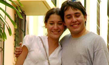 María Eugenia and Emilio pose for a photo in San Juan.